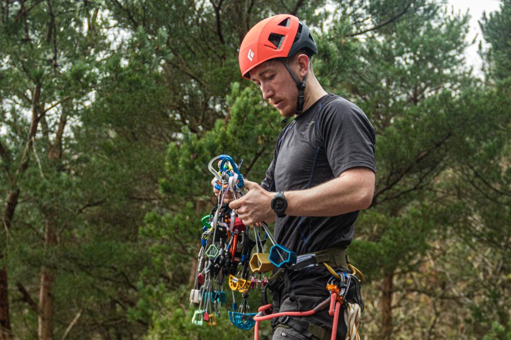 Climbing instructor with gear