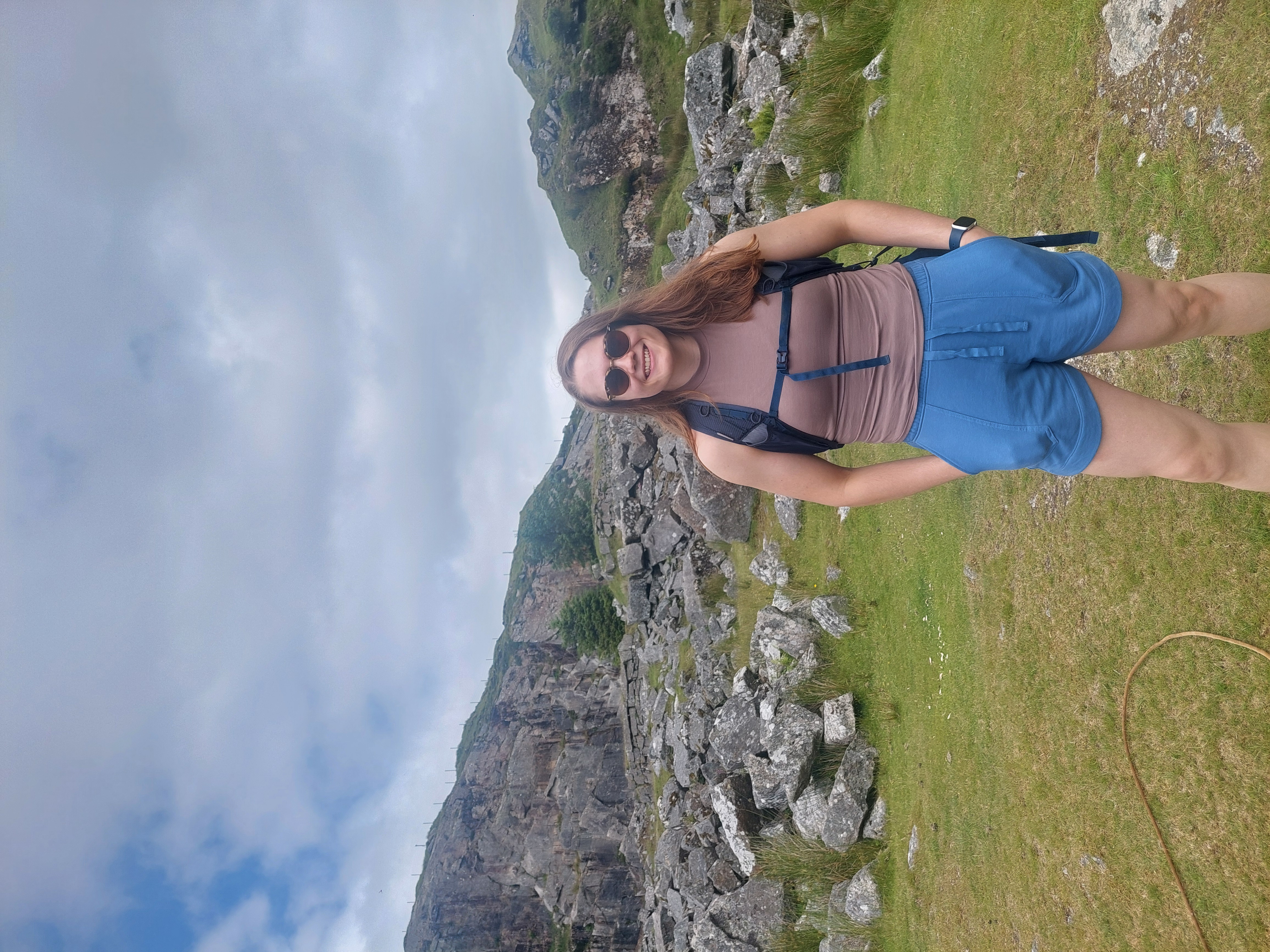 Hiker in mountain landscape